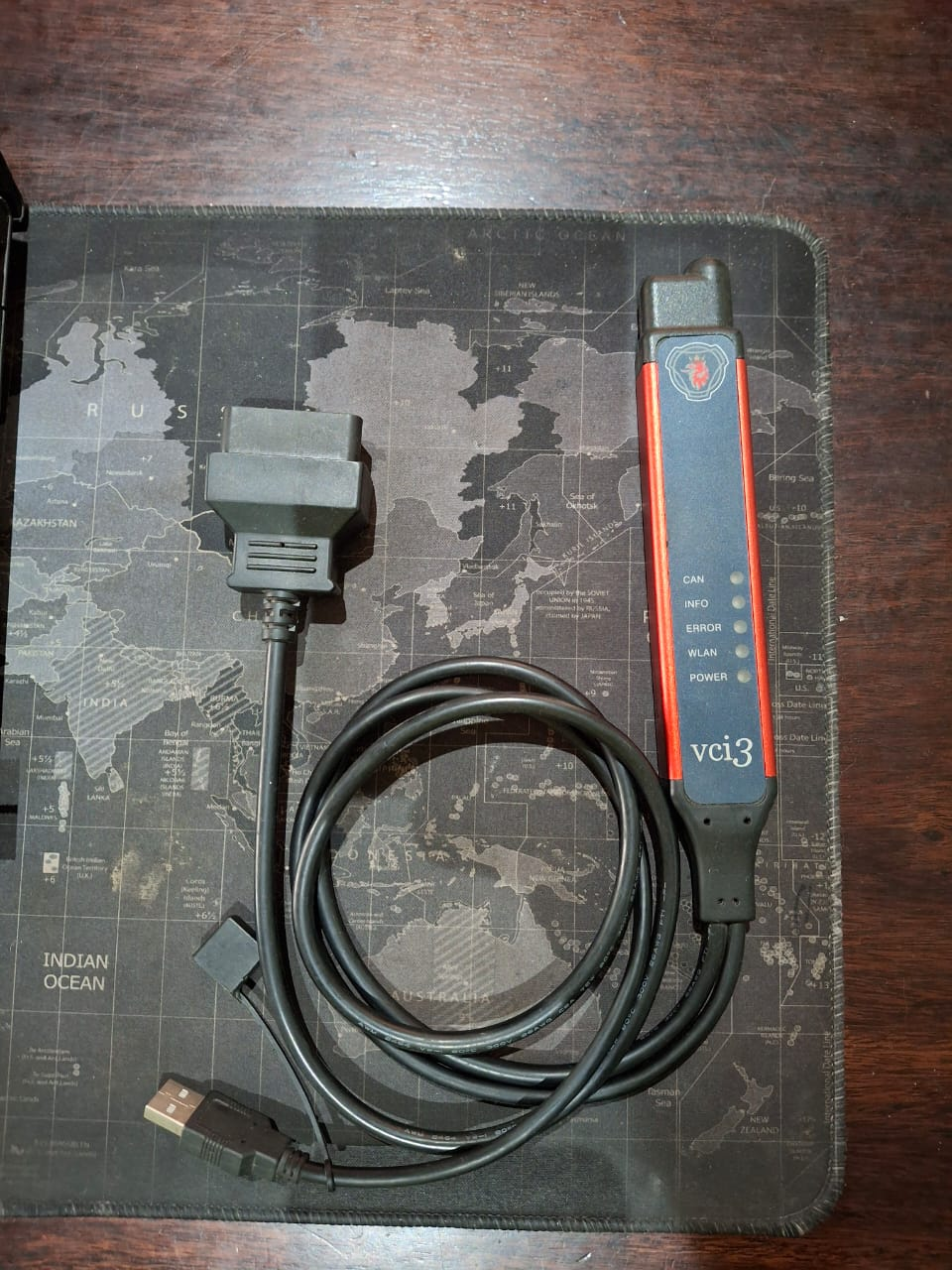 Scania VCI3 diagnostic interface with OBD connector and USB cable. Client-supplied Dieselman Nam diagnostic tool image.