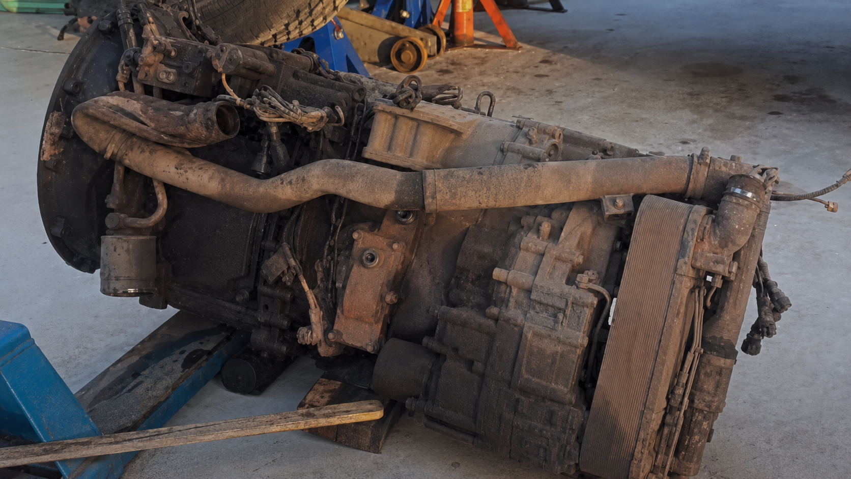 Heavy-duty truck undercarriage and drivetrain, restored from real client workshop footage.